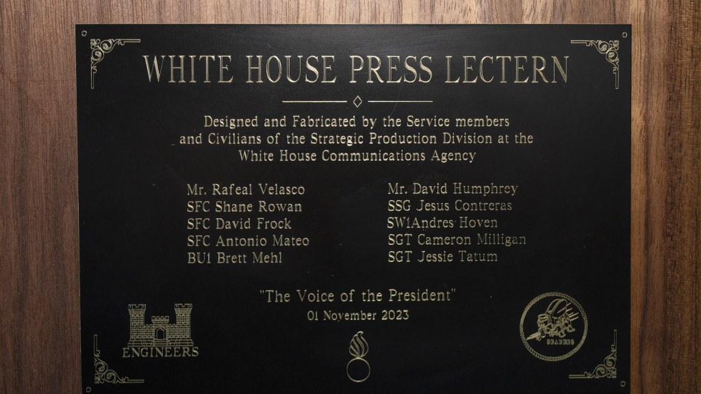 A plaque on the wall of the White House press briefing room.