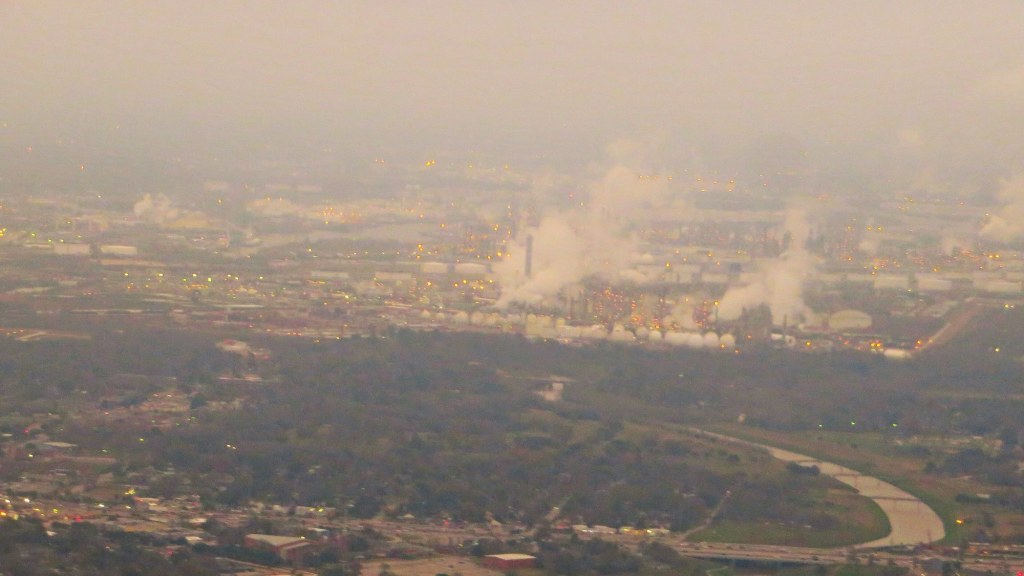 Refinery towers and storage tanks at a petrochemical complex near Houston, Texas.